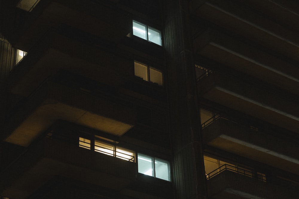 a building with windows and a pole