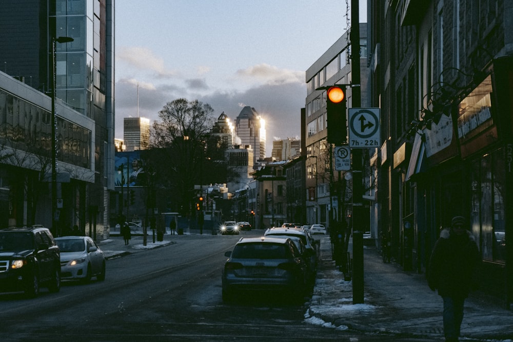 a street with cars and buildings