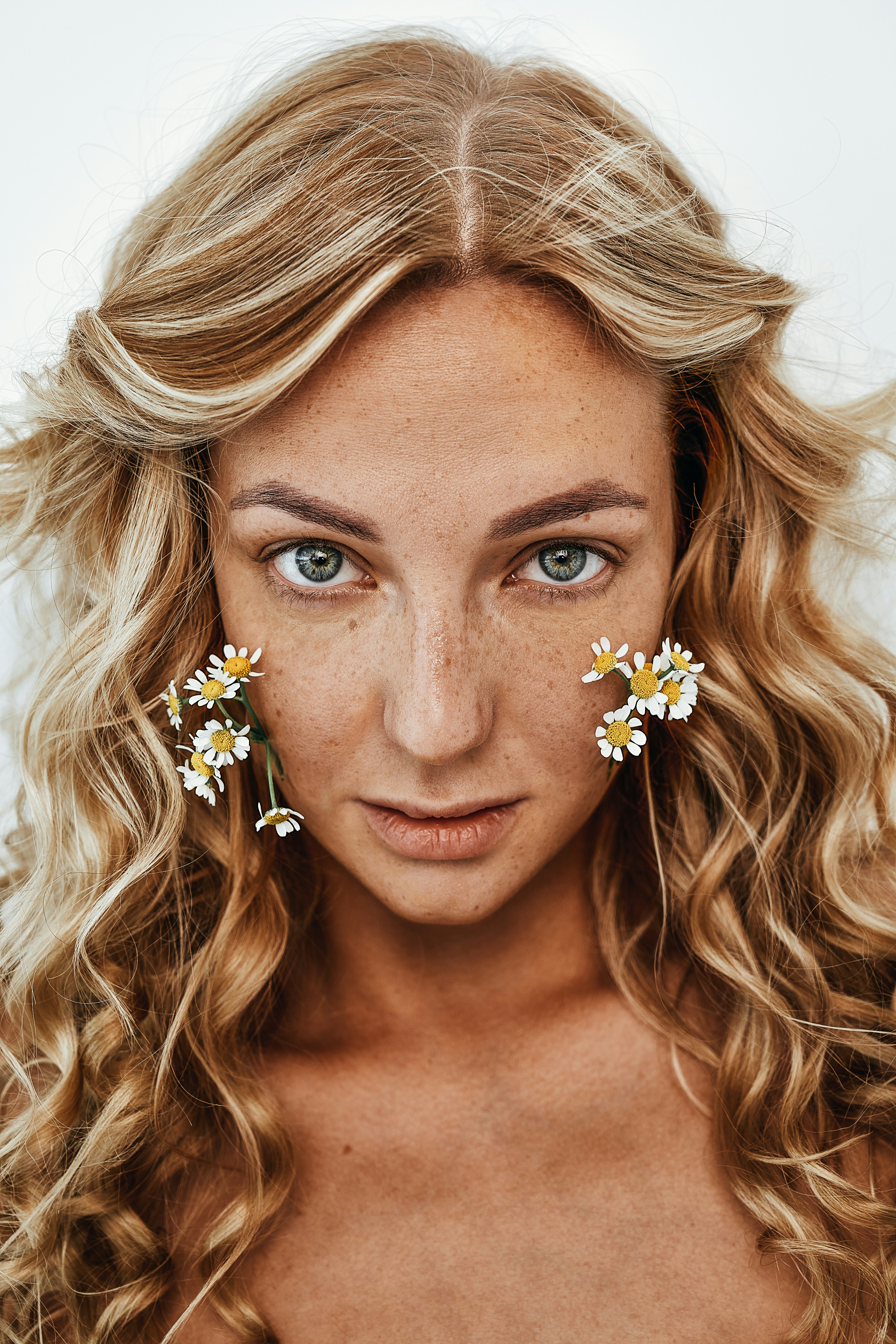 a woman with flowers in her hair