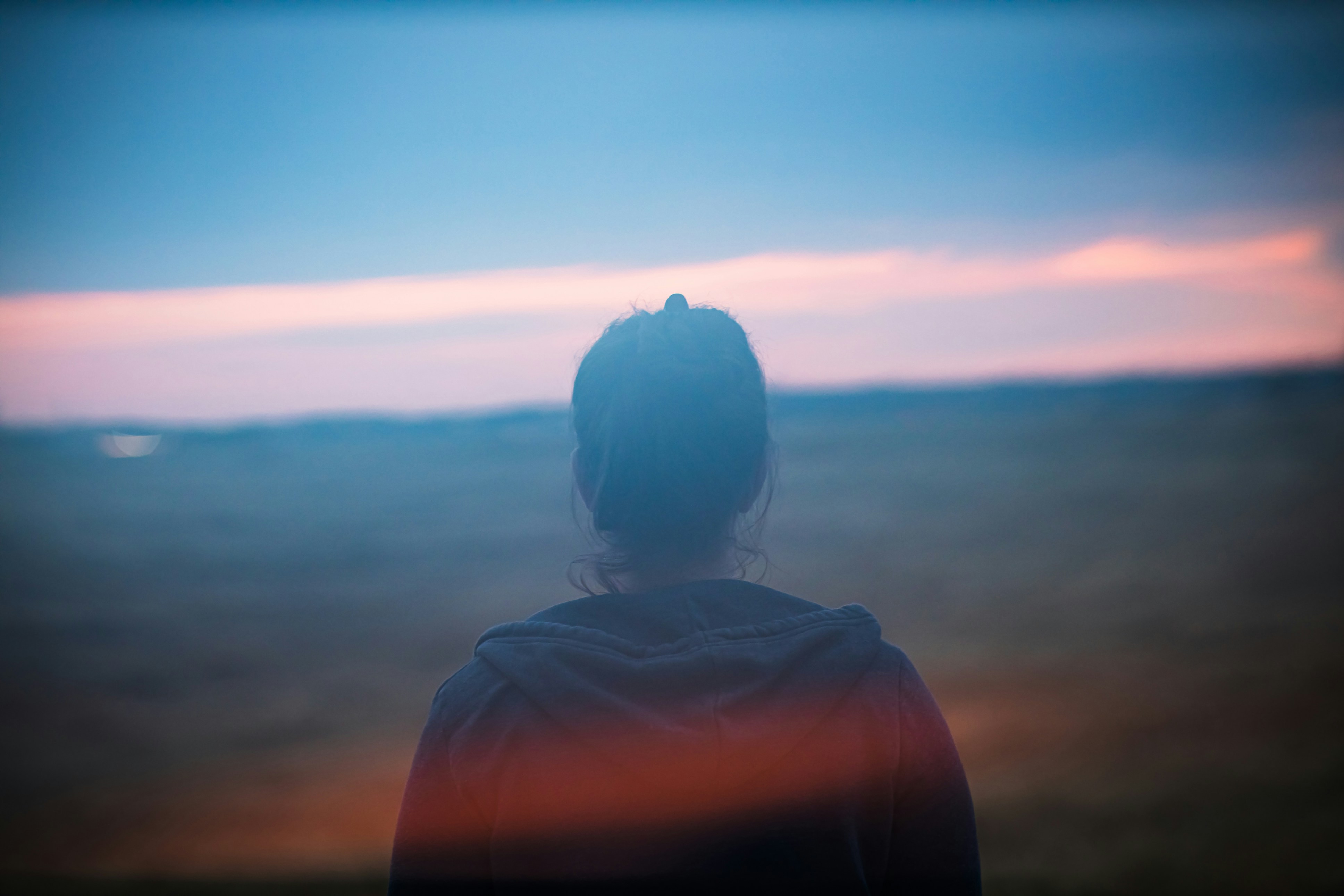 a person looking out over the clouds