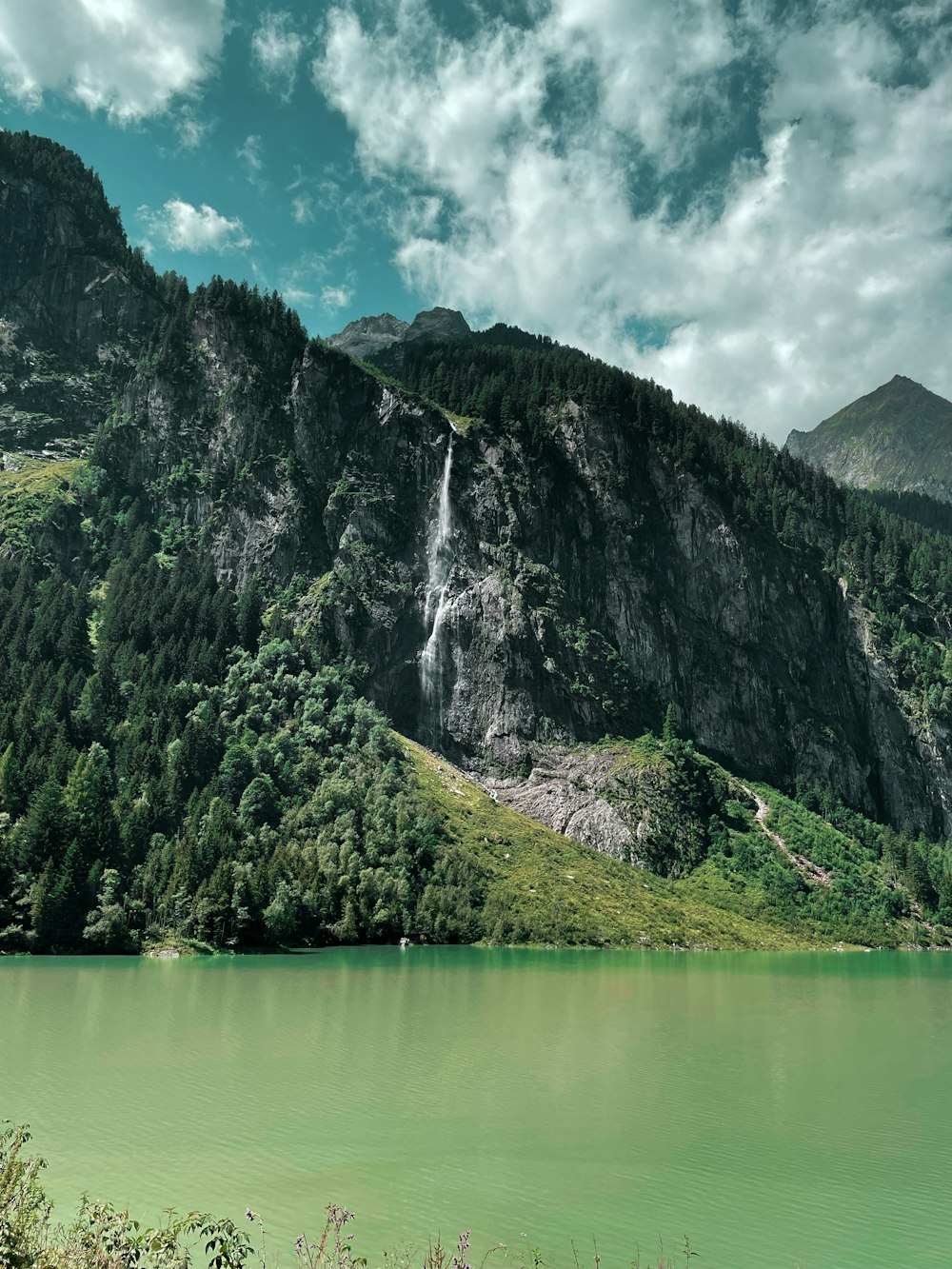 a waterfall over a cliff