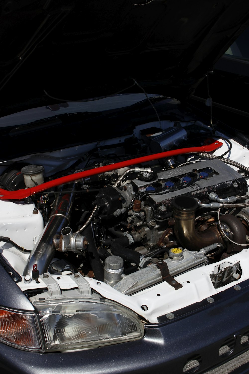 a car engine with its hood open