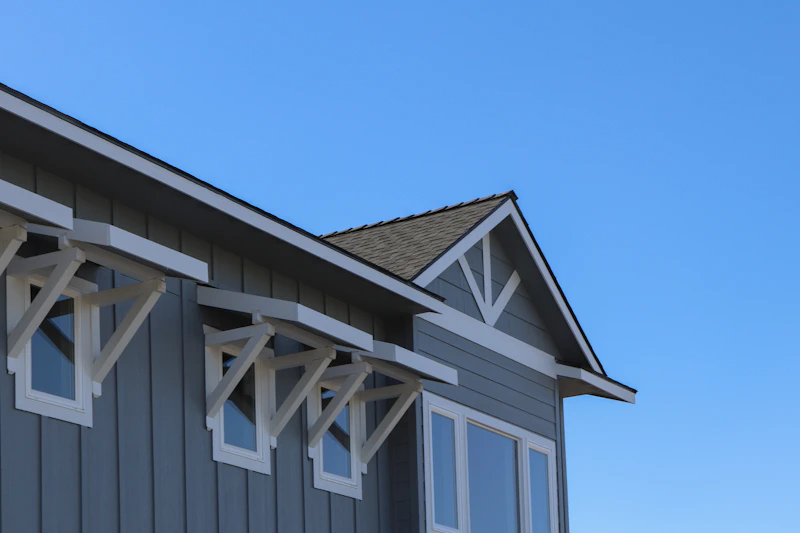 Sample estate home under blue Idaho sky