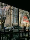 Exterior view of a bustling Northbridge Global Culinary restaurant in Vancouver at dusk.