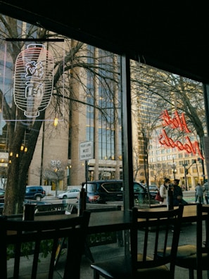 Exterior view of a bustling Northbridge Global Culinary restaurant in Vancouver at dusk.