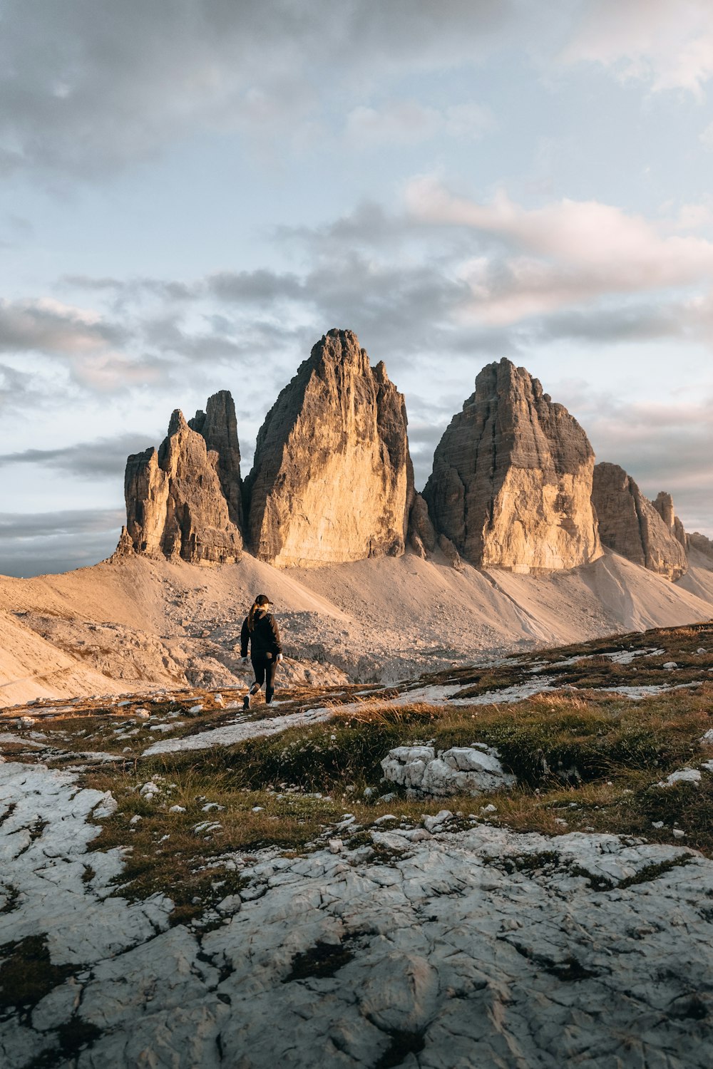 a person walking on a rocky path