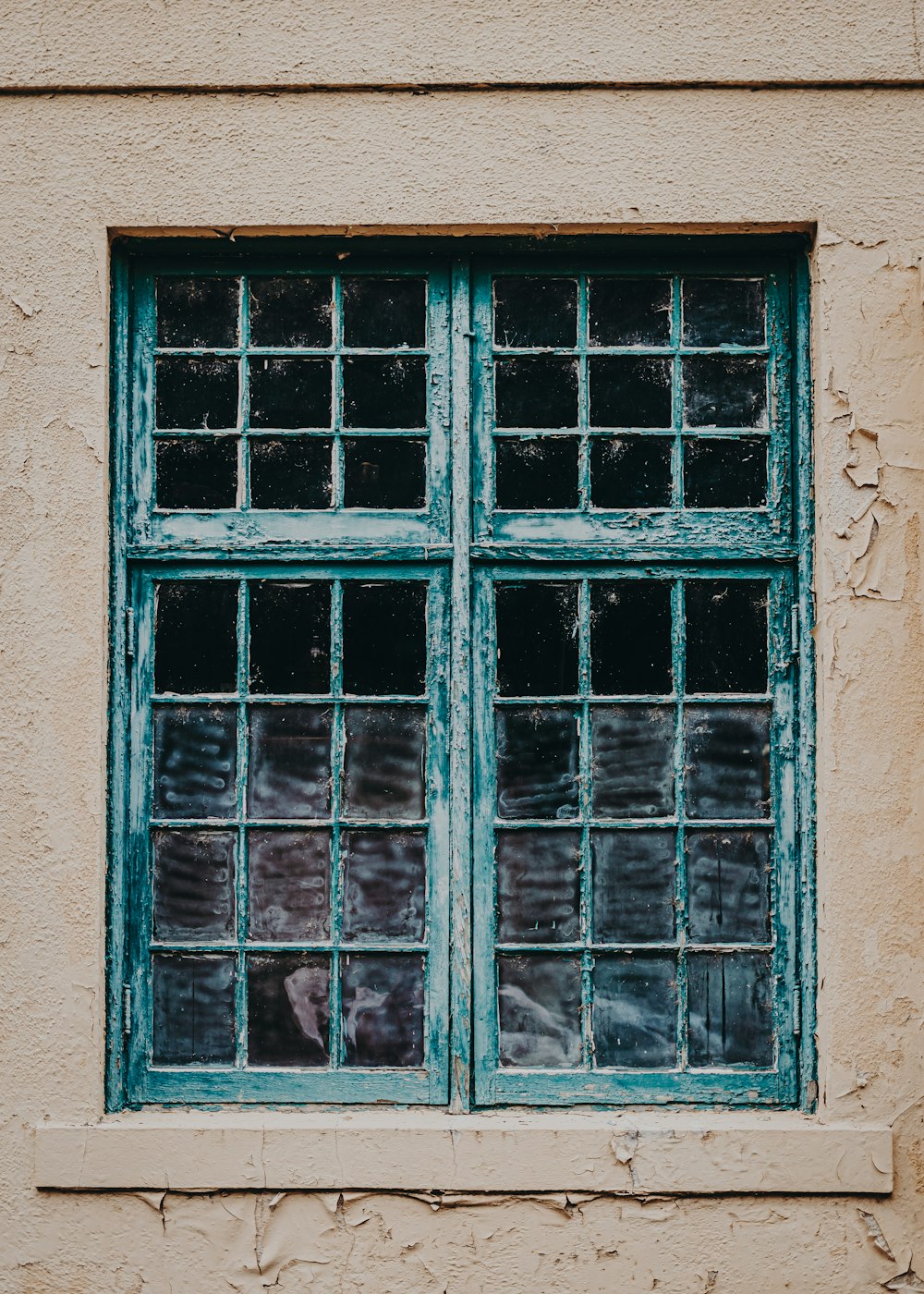 a window with a blue frame