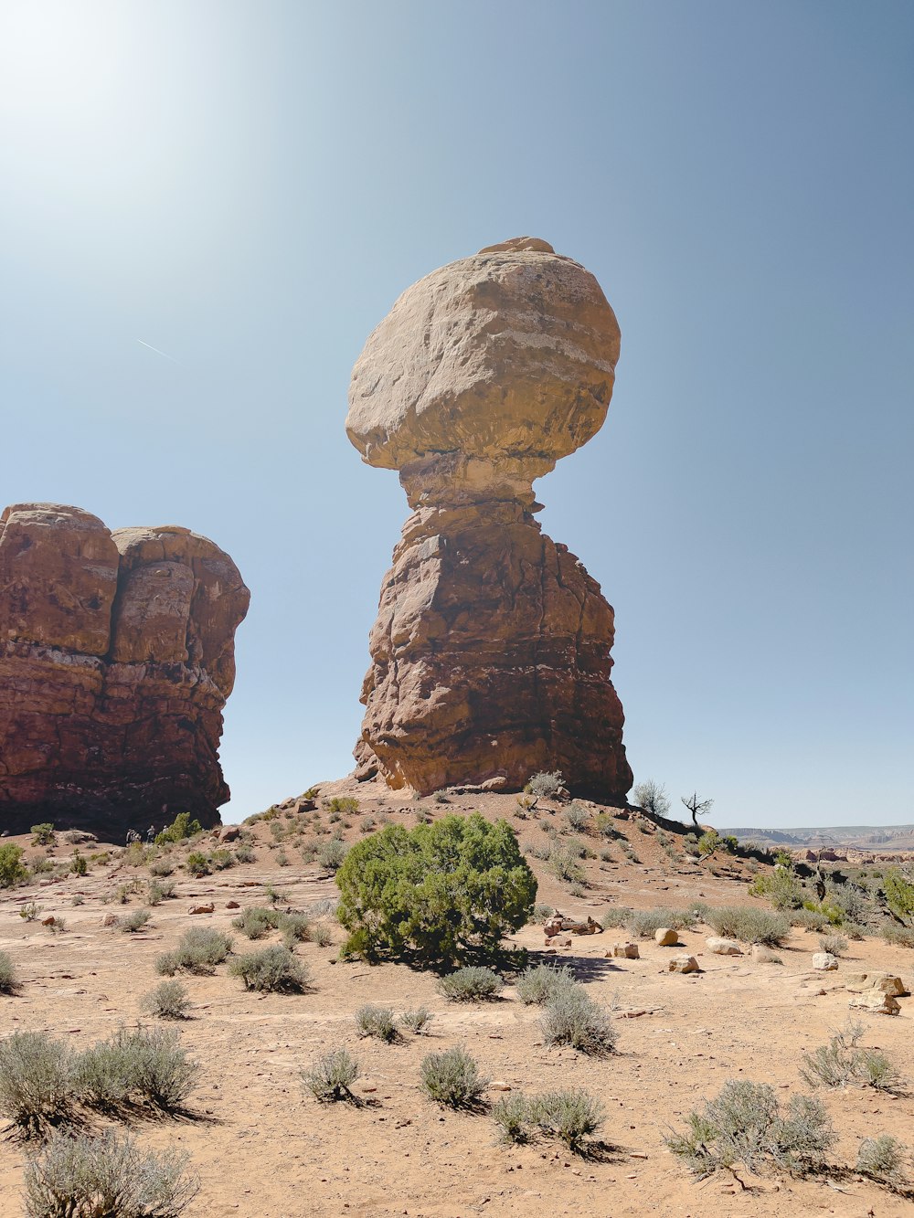 a group of large rocks in a desert