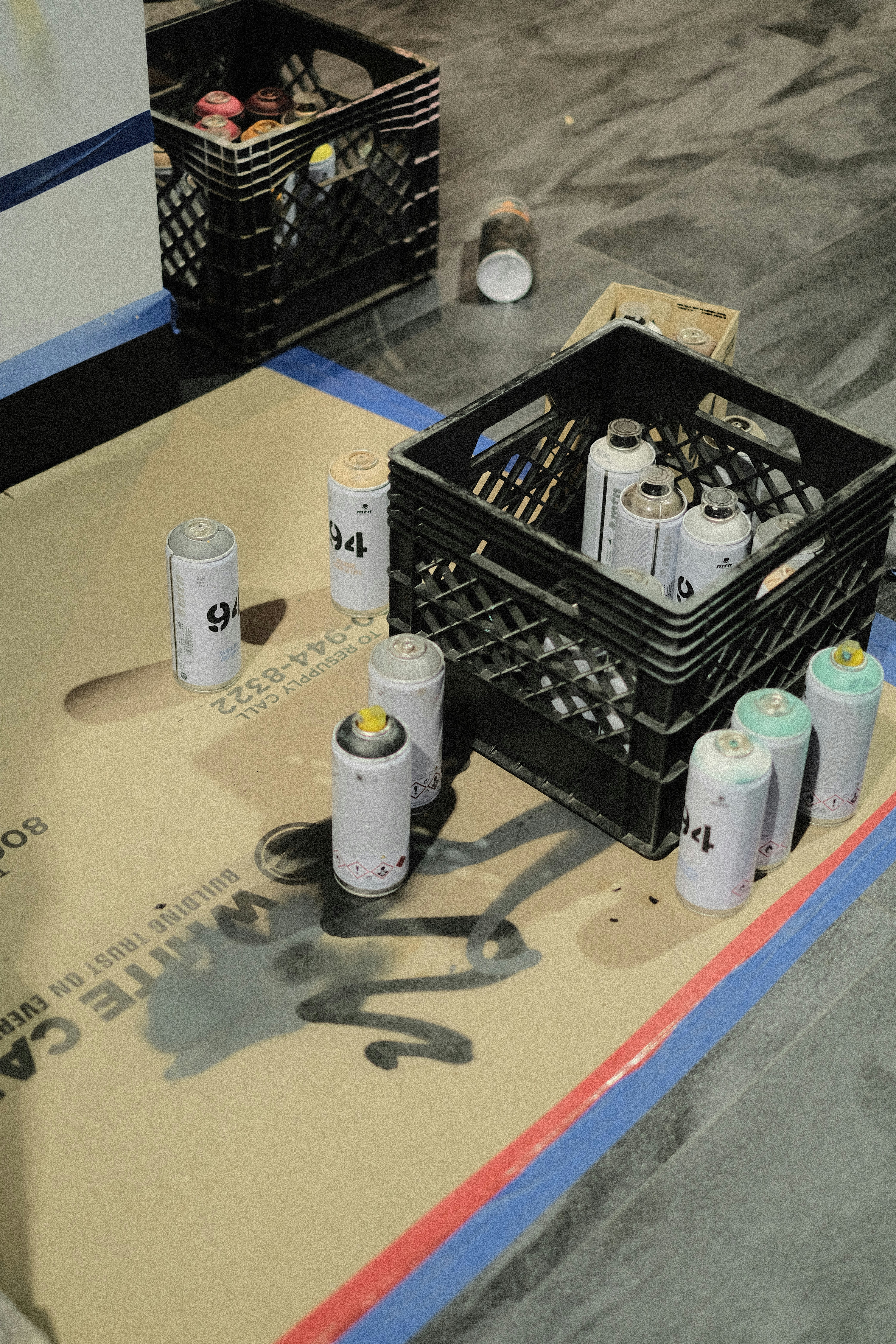 a group of cans and bottles on a table