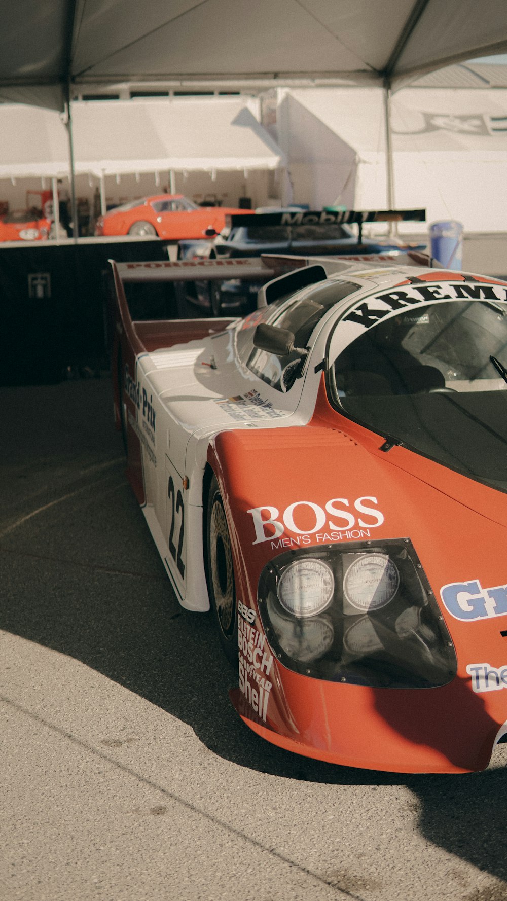 a race car parked in a garage