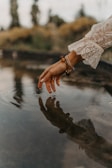 a hand holding a chain