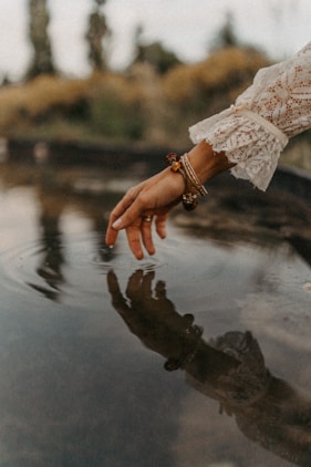 a hand holding a chain