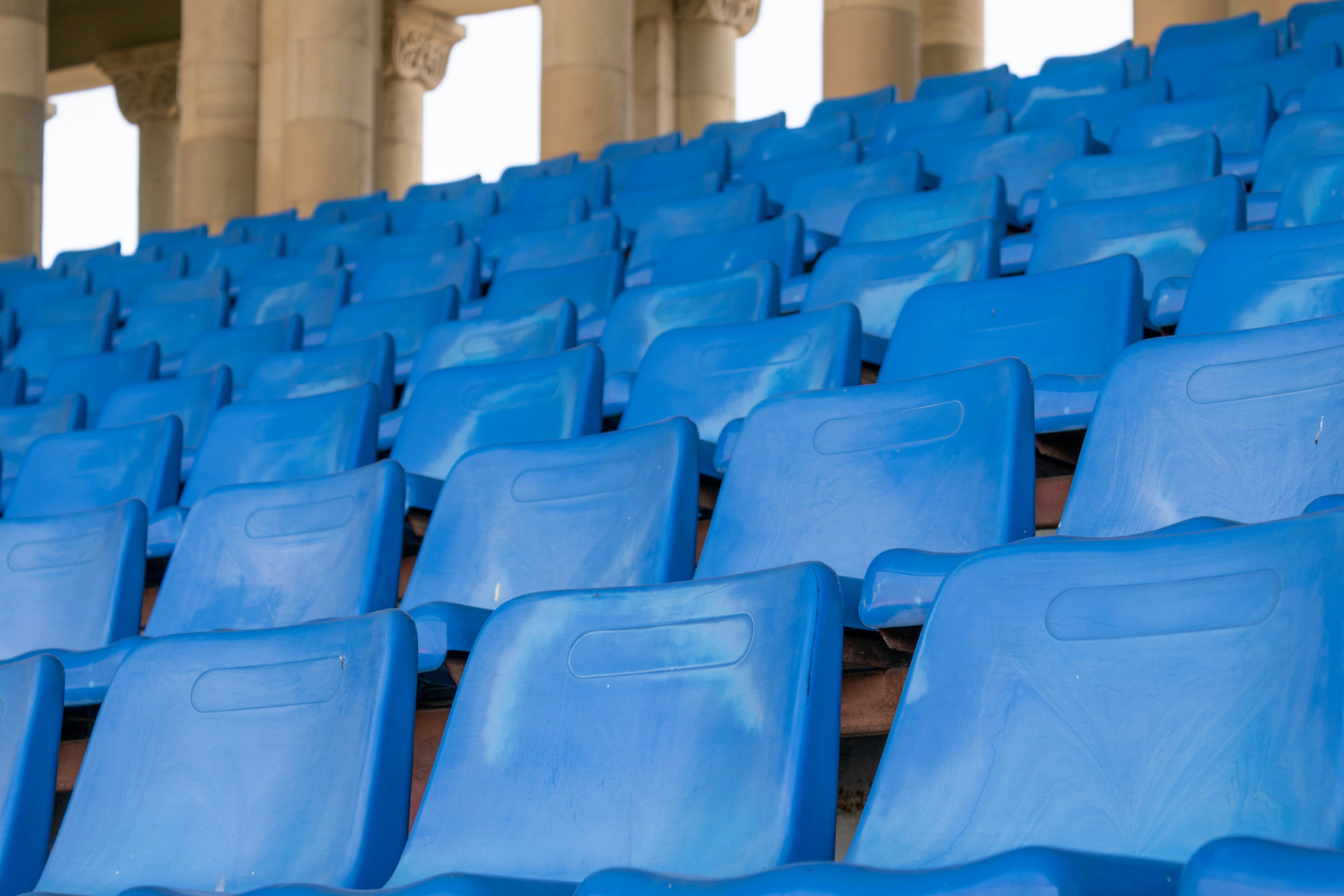 rows of blue chairs, 