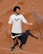 A person stands on a clay tennis court, wearing a white t-shirt with a logo and black shorts. A tennis racquet is being tossed or caught in the air, casting a shadow on the ground.