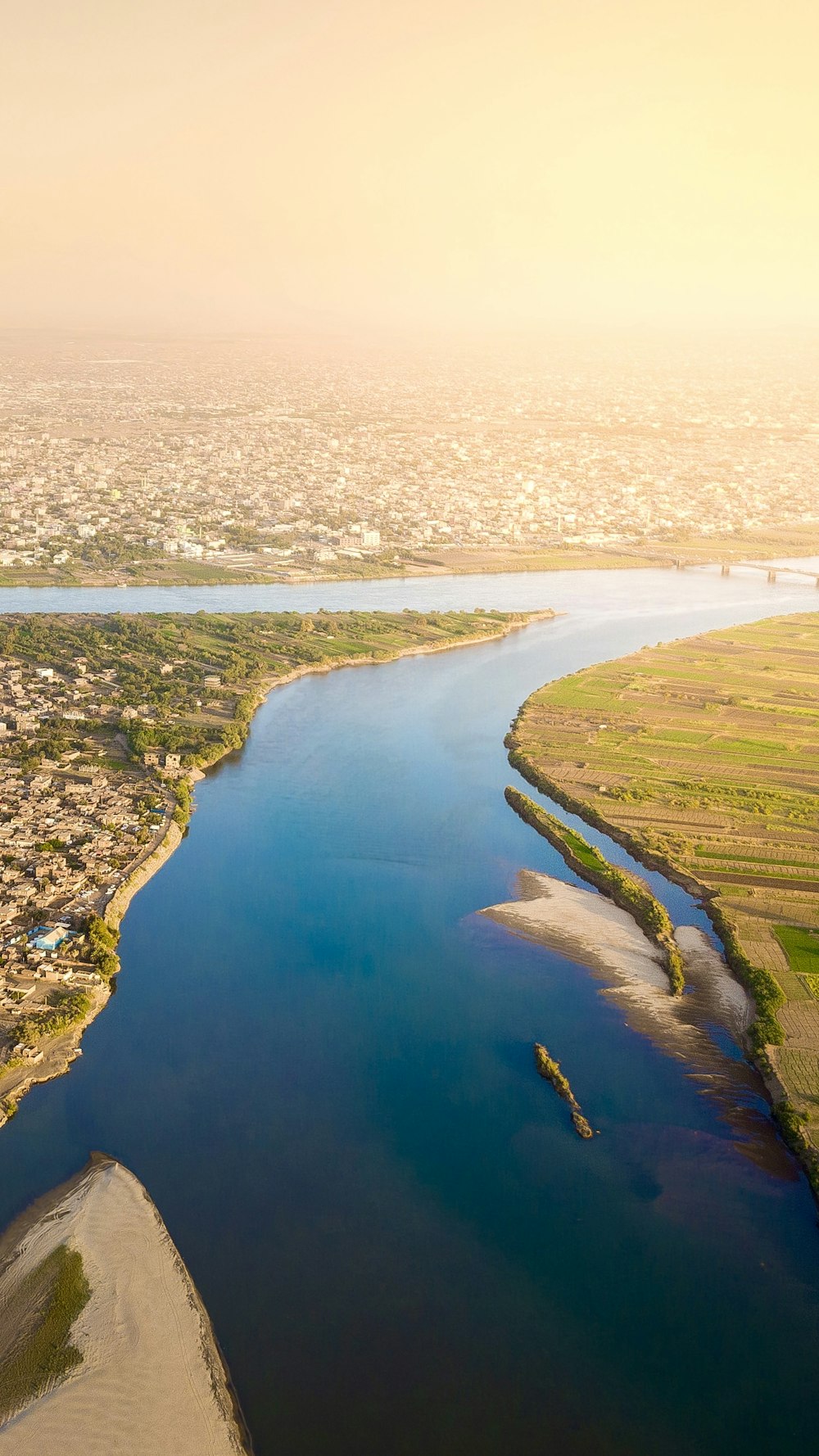 a river with a city in the background