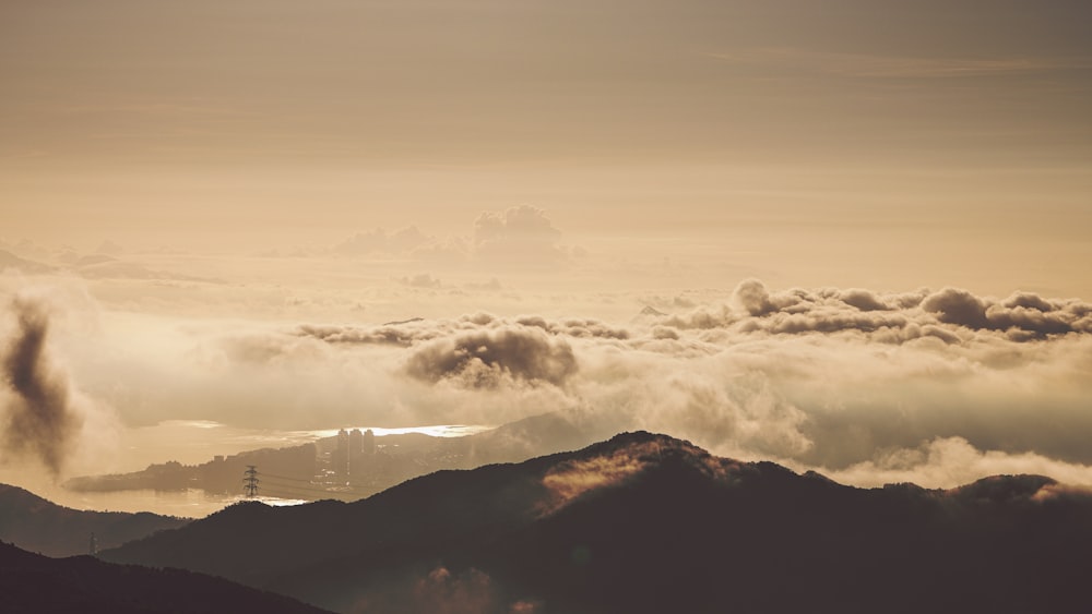 a mountain with clouds