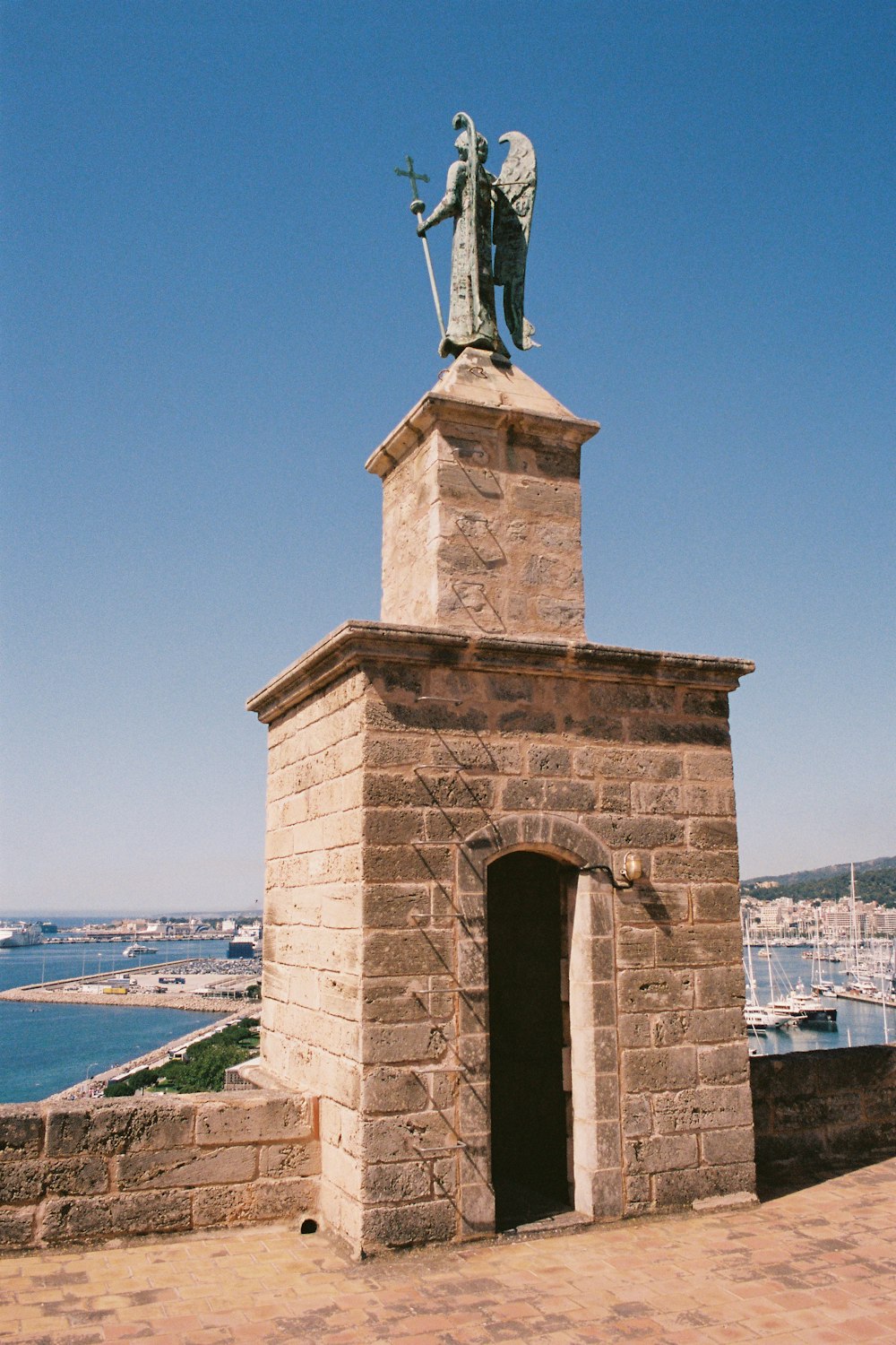 a statue on top of a building