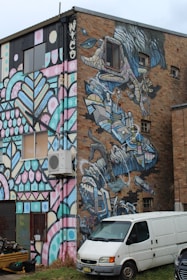 An engaging image of an Arctic Breeze HVAC van parked outside a home.