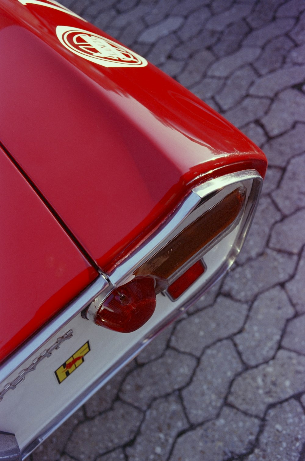 a red car with a spoiler