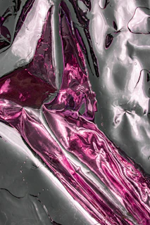 a close-up of a pink and white iceberg
