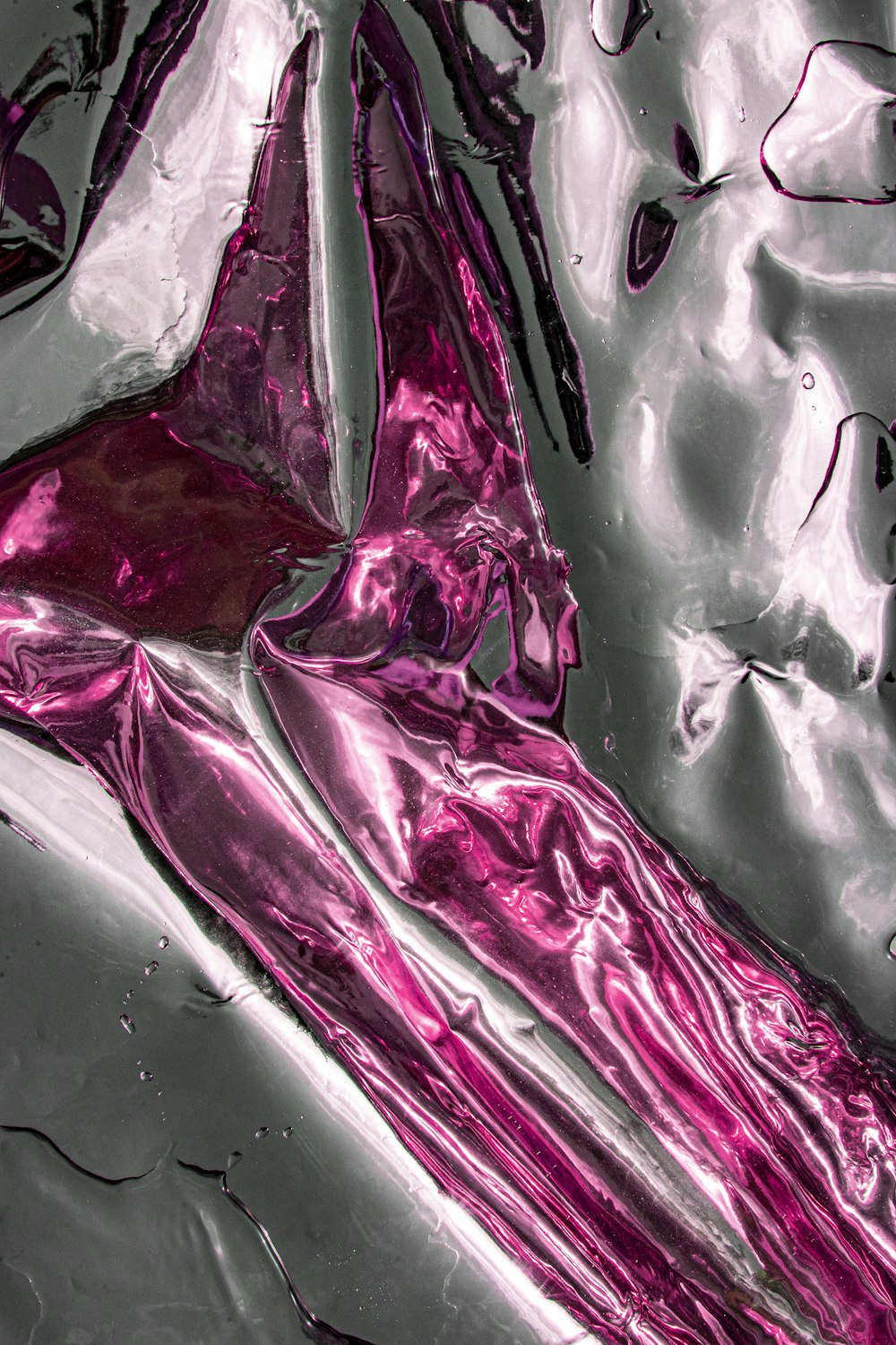 a close-up of a pink and white iceberg