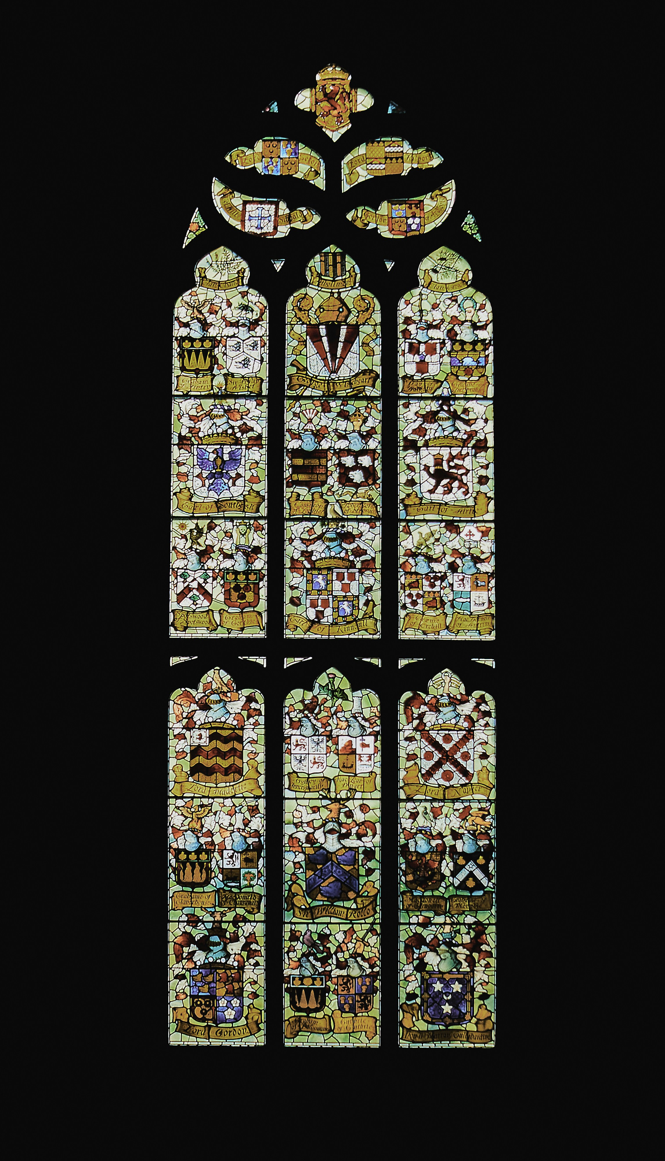 A stained-glass window in St. Giles' Cathedral featuring prominent Scottish noblemen and their families coats of arms (Sep., 2021).