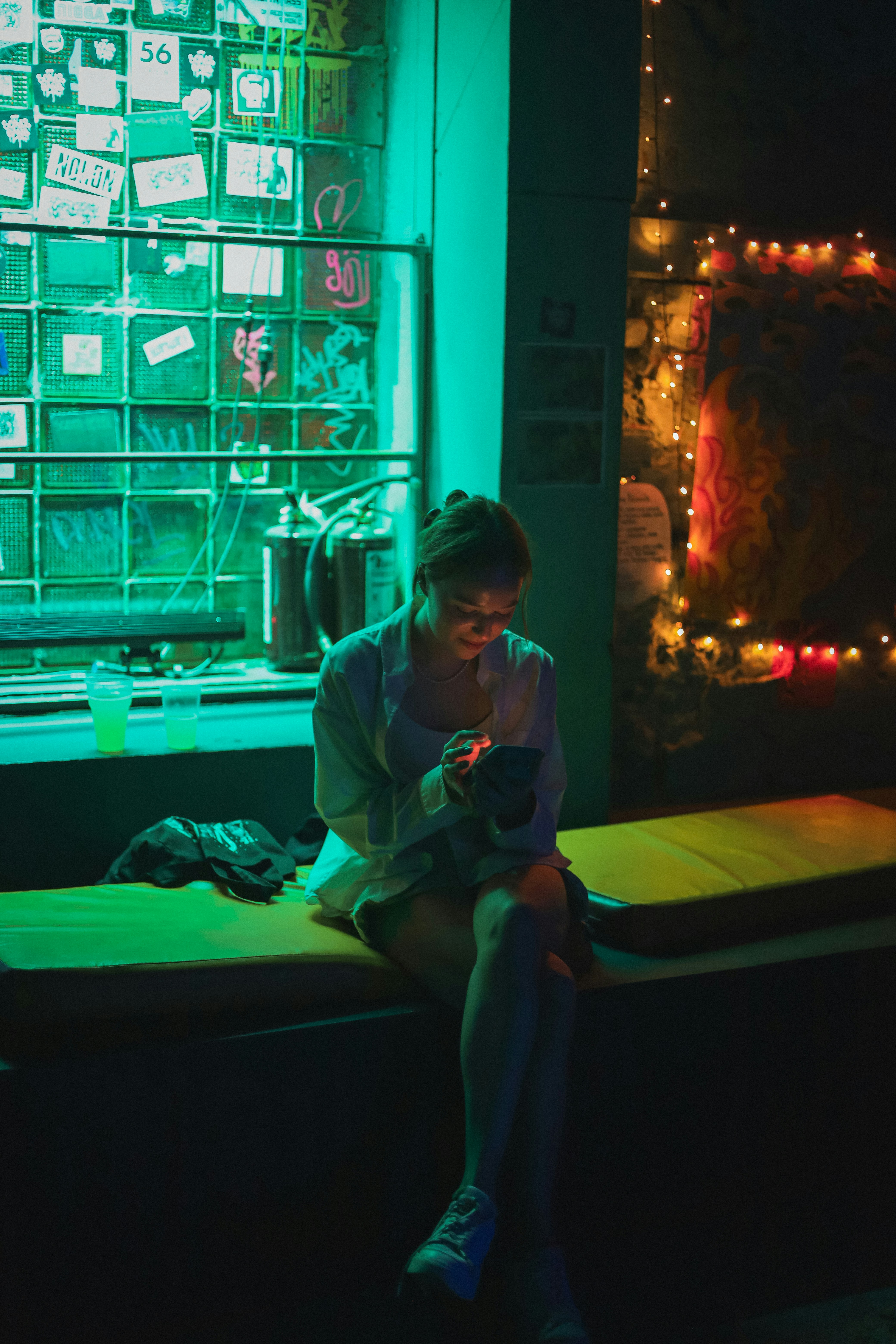 a person sitting on a bed