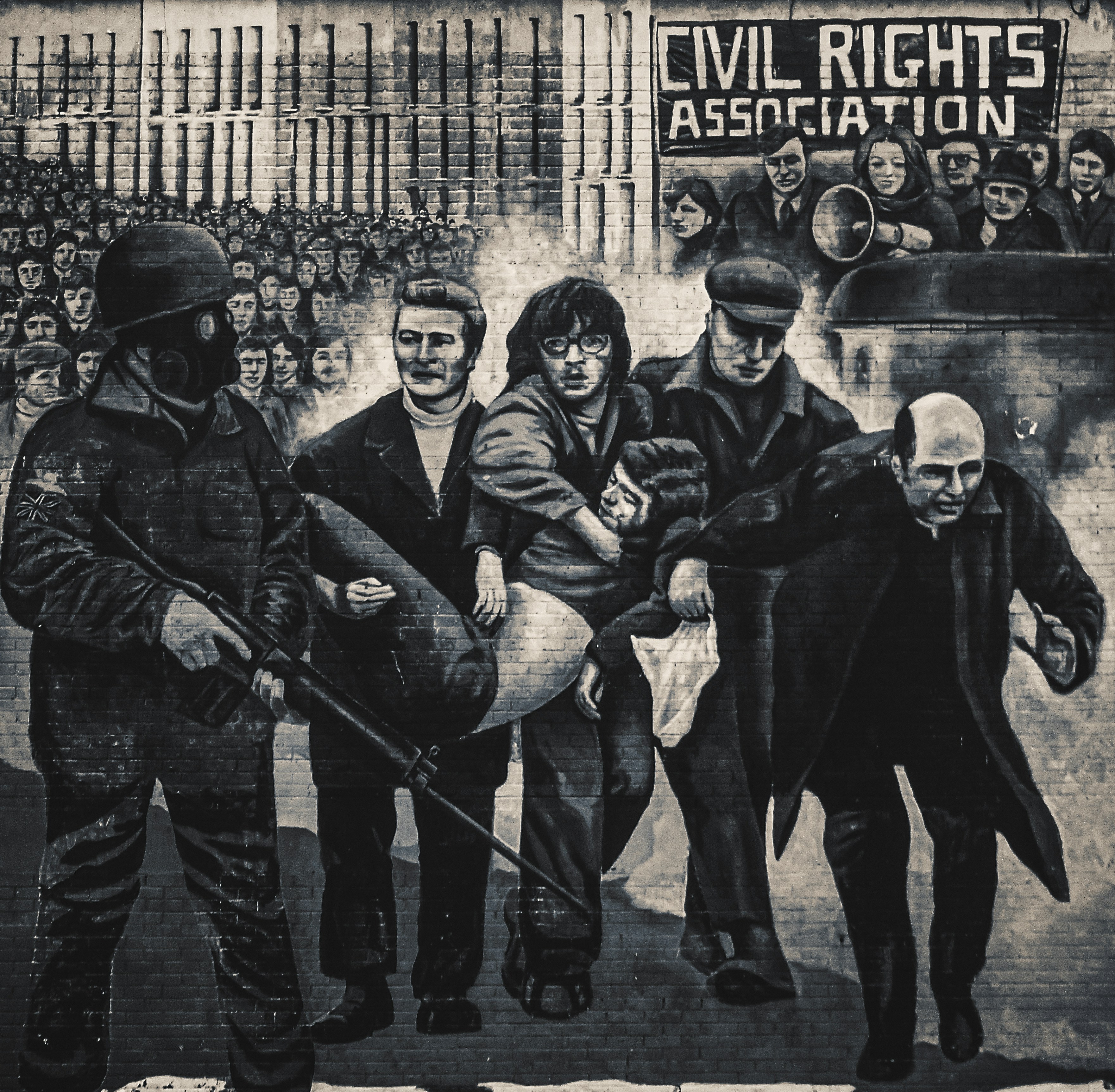 A mural at Free Derry Corner in Londonderry depicting Bloody Sunday, a significant historical event in Northern Ireland's Civil War (photo taken, May, 2021). This image is reproduced with permission of the artists, 