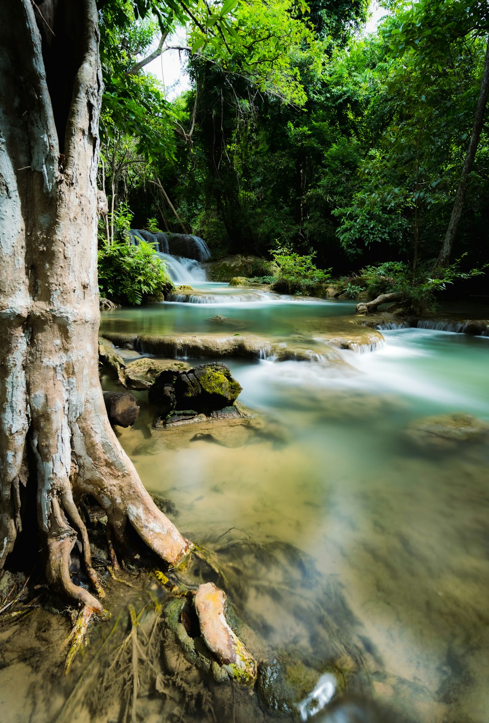 a river with a waterfall