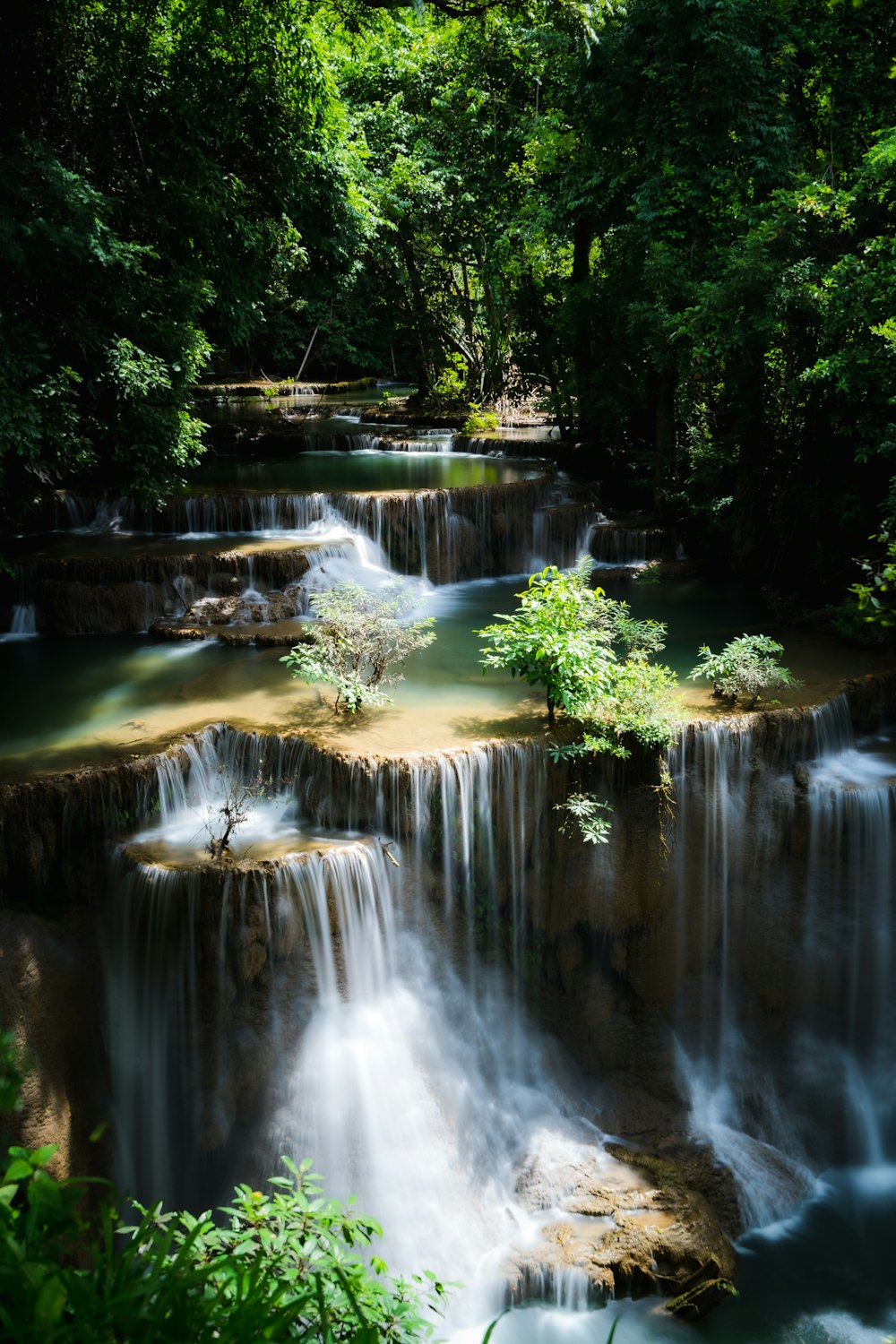 a waterfall in a park