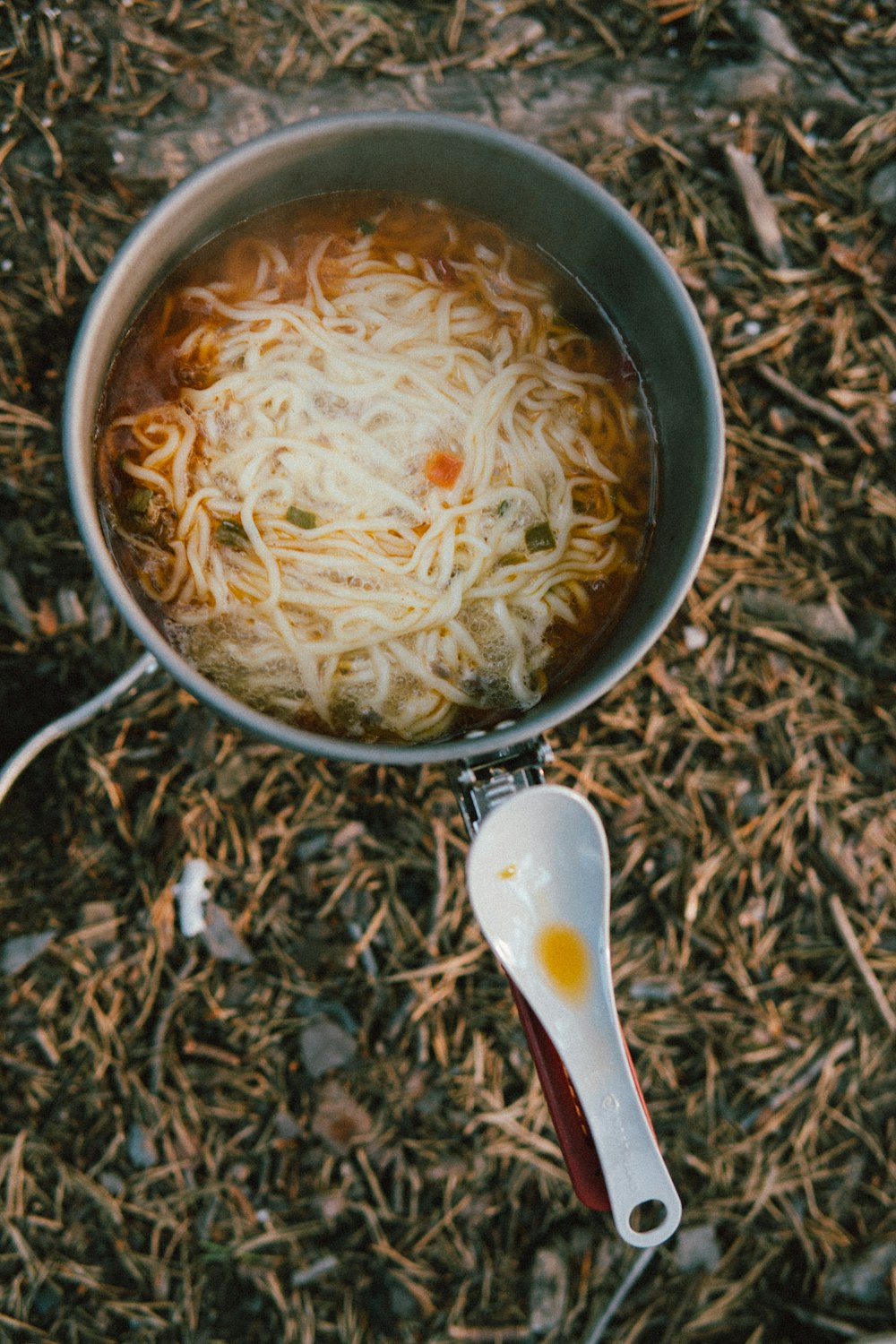 a bowl of soup with a spoon