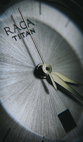Close-up of a Titan World watch face showcasing intricate craftsmanship and elegant design.