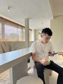 Lifestyle shot featuring a user enjoying sietra products in a modern, bright space.