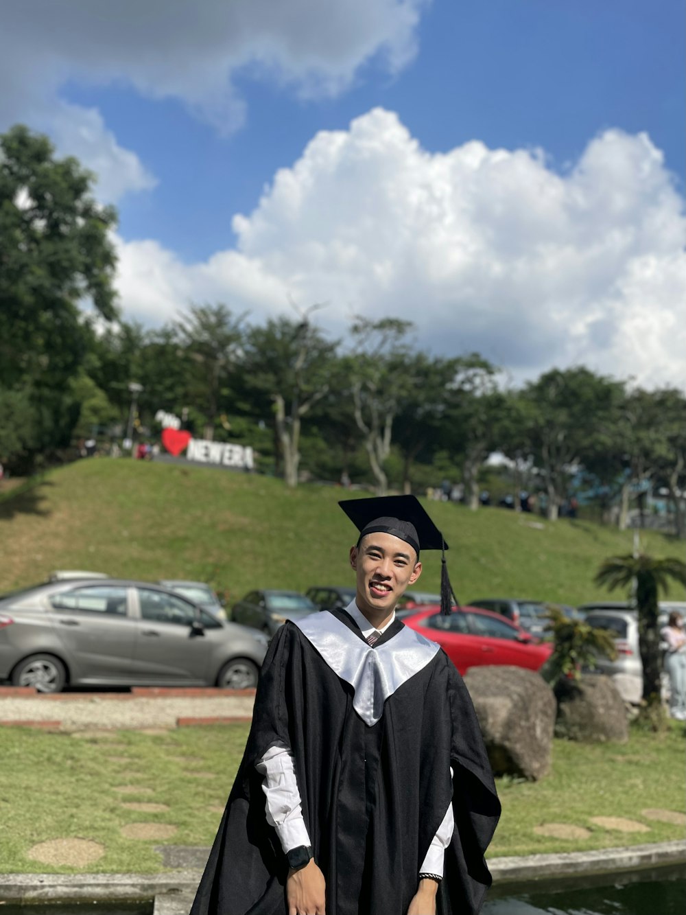 a man in a graduation gown