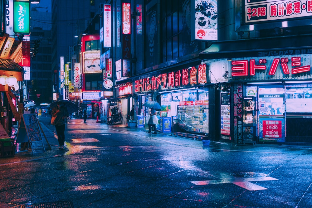 people walking in the rain