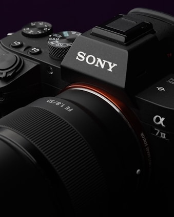 a black speaker next to a black speaker