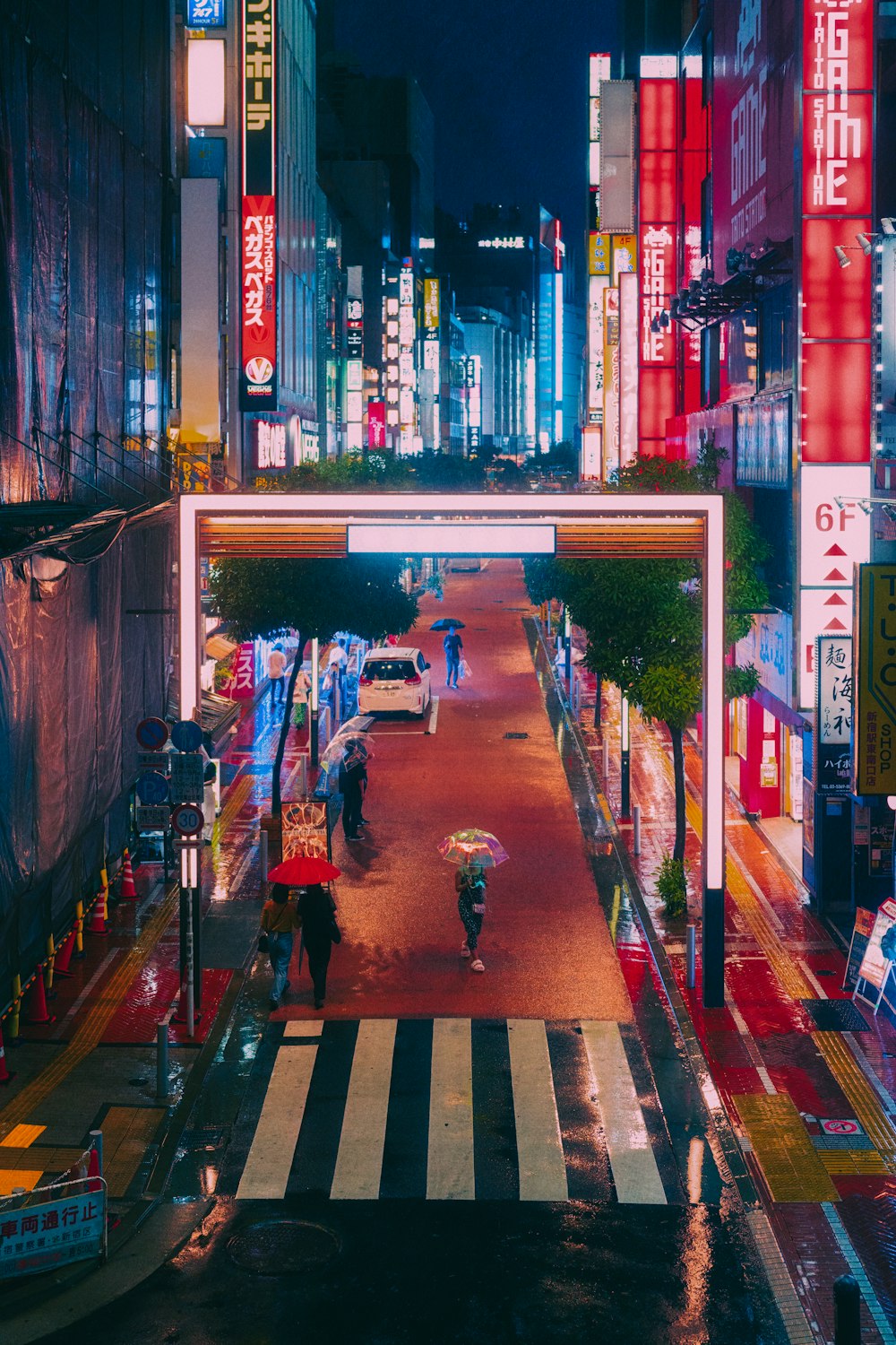 a busy street with people and cars