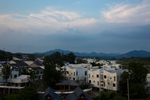 A serene landscape with a data center in the background, symbolizing connectivity.
