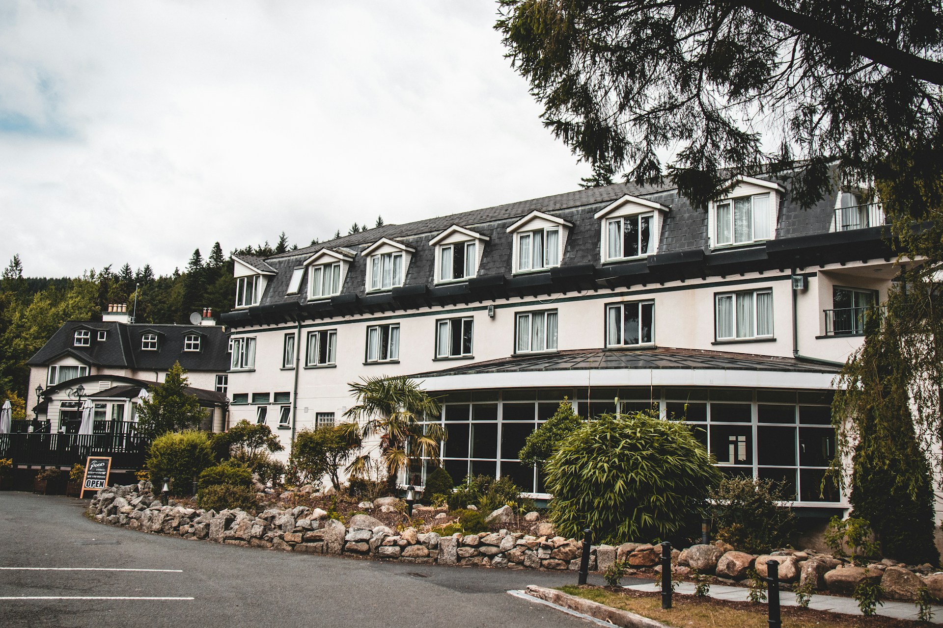 woman wearing yellow long-sleeved dress under white clouds and blue sky during daytime