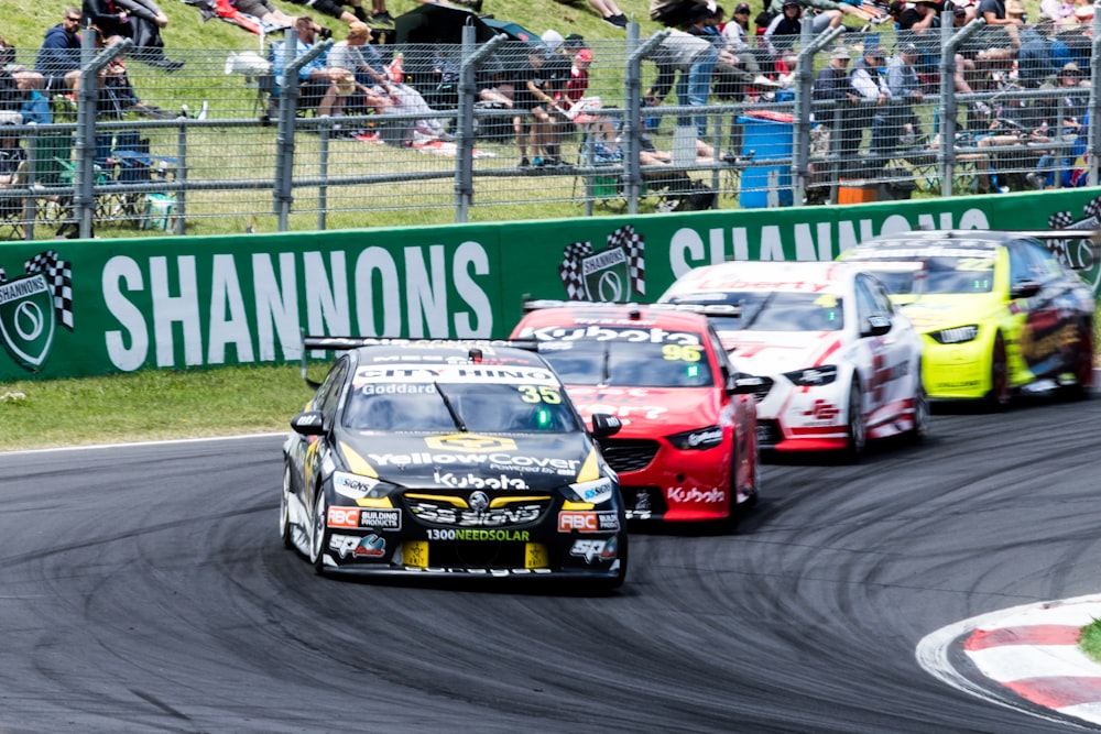 a group of race cars on a track