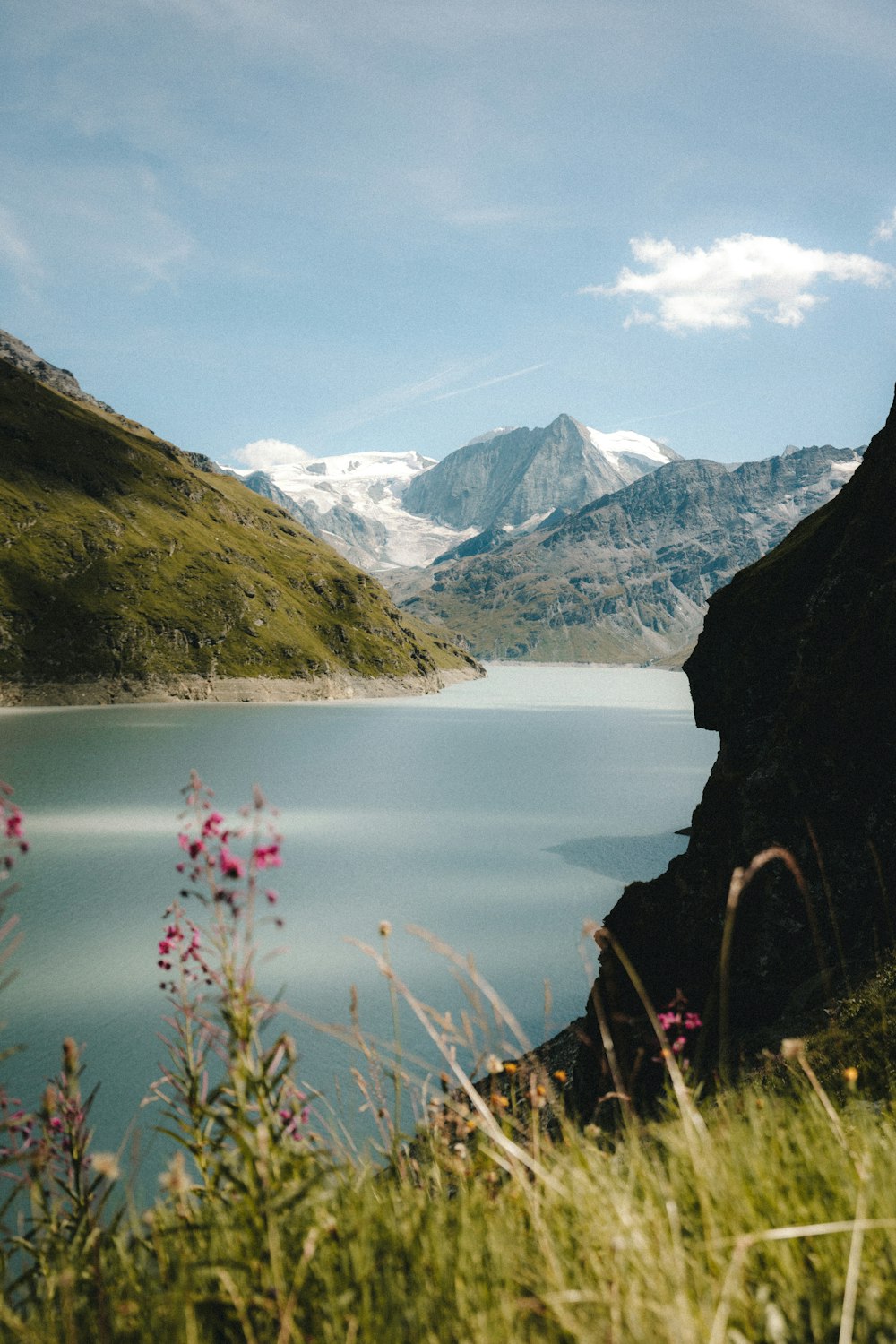 a lake surrounded by mountains