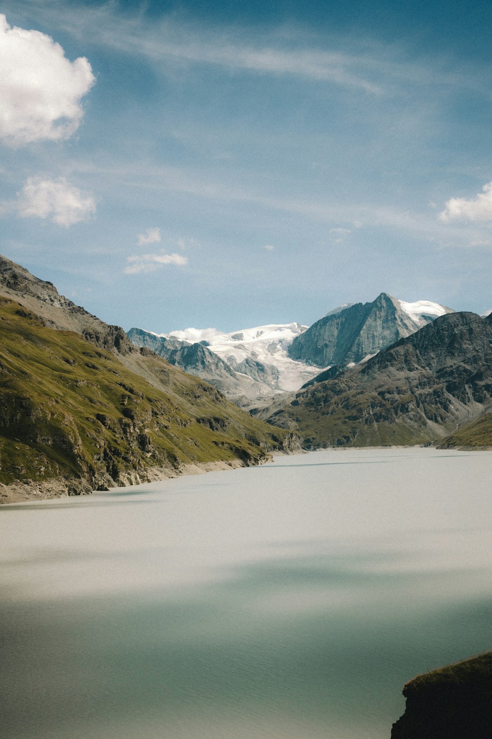 a lake with a mountain in the background