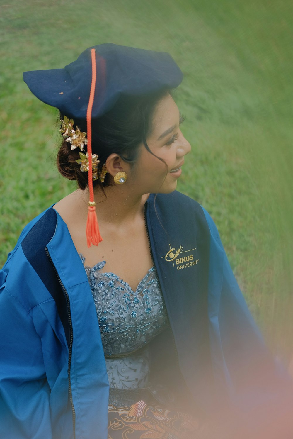 a woman wearing a graduation cap