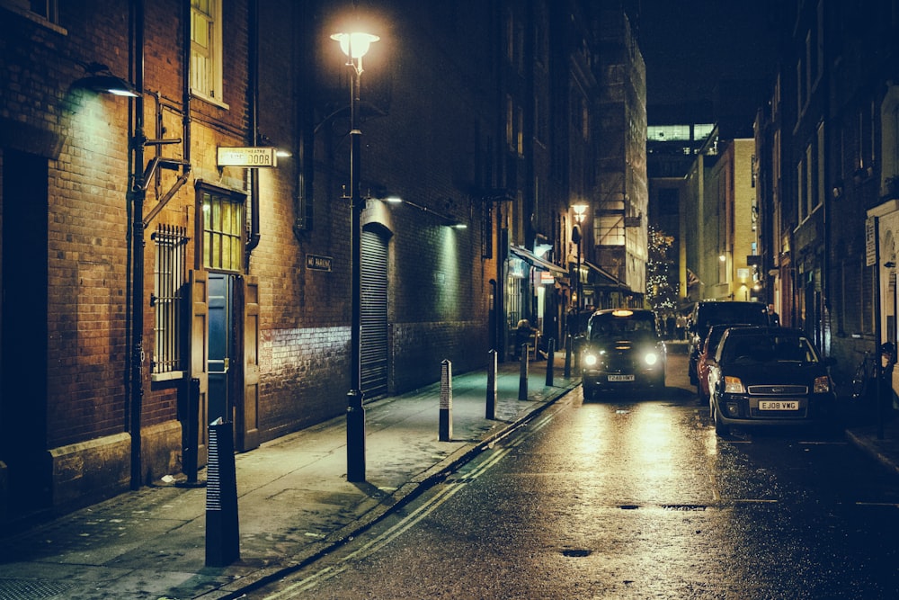 cars on a street at night