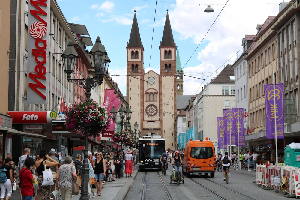 a busy street with people and vehicles