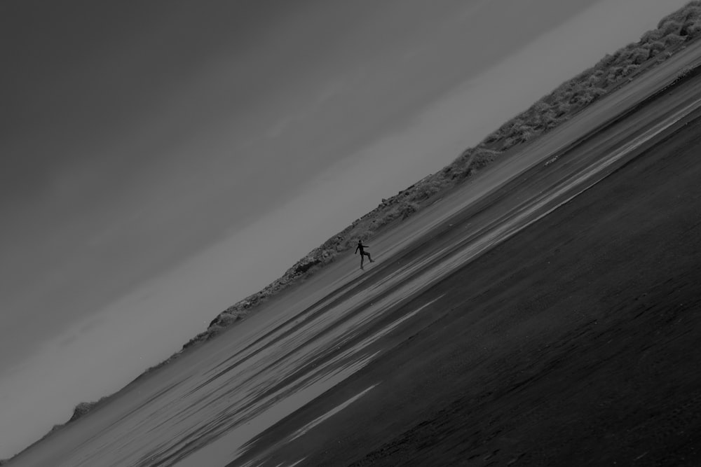 a person walking on a snowy mountain