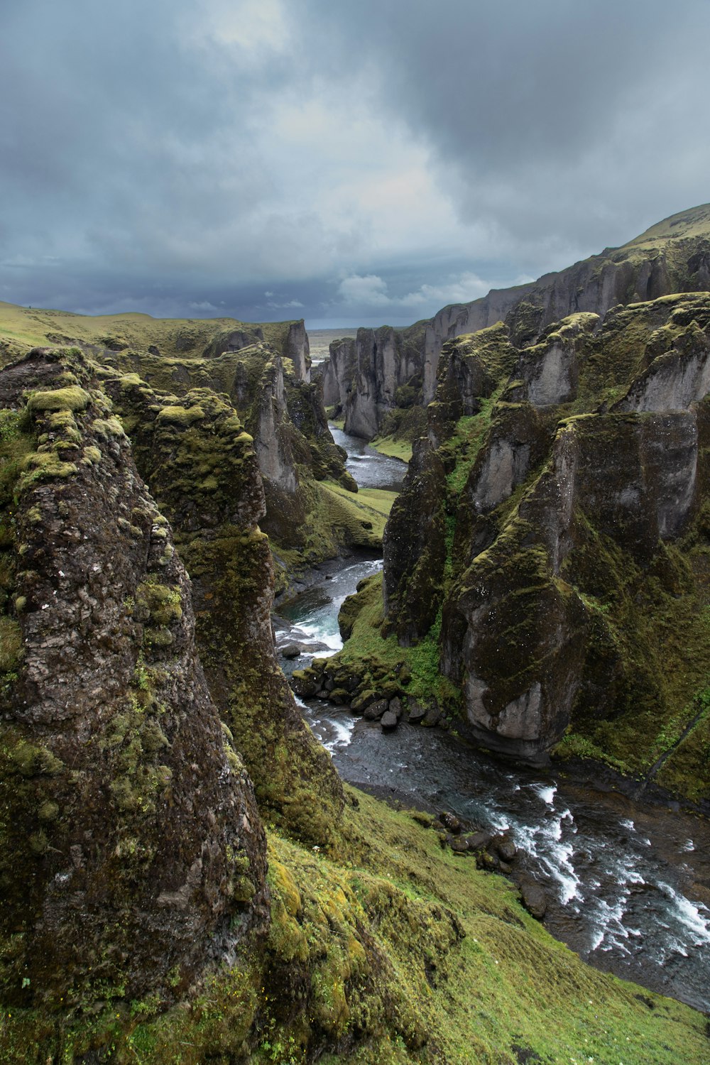 a river running between rocky cliffs