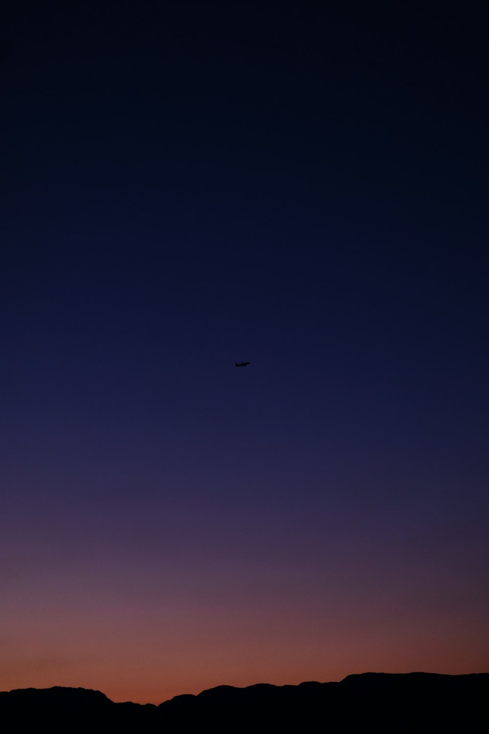 a plane flying in the sky