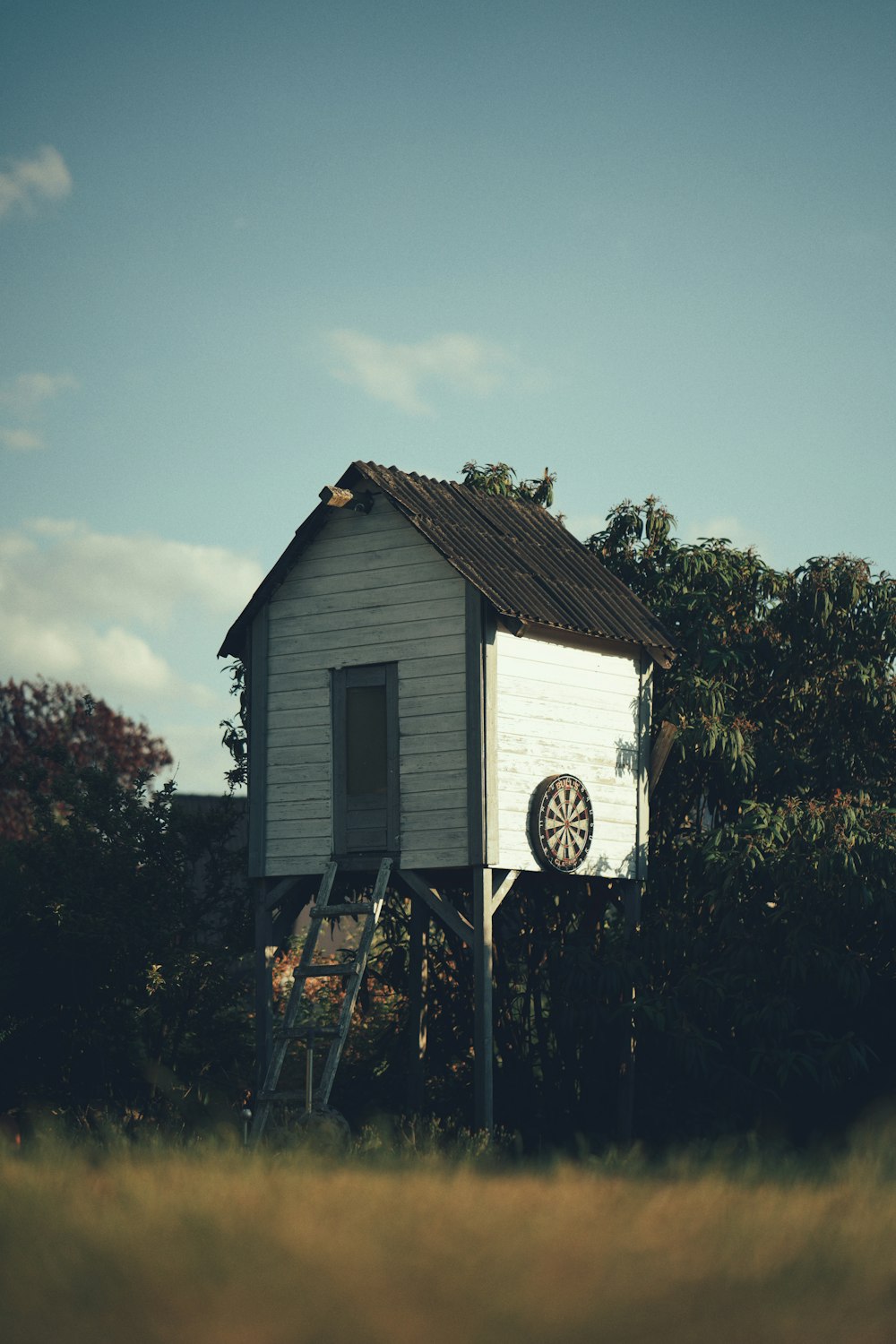 a white building with a clock on it