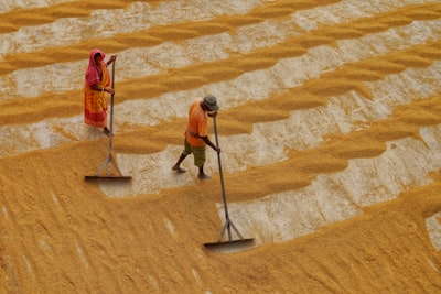 a man and woman in a desert